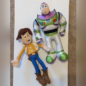 Buzz Light-year and Woody stuffed animals